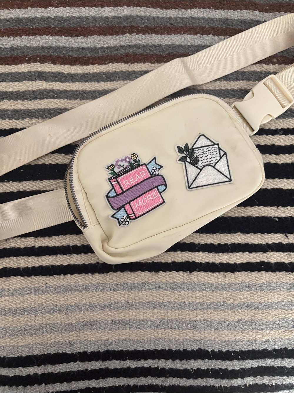 Crossbody Fanny pack with themed patches.